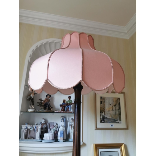 495 - Mahogany standard lamp  with reeded column and three outawept legs on claw and ball feet, with origi... 