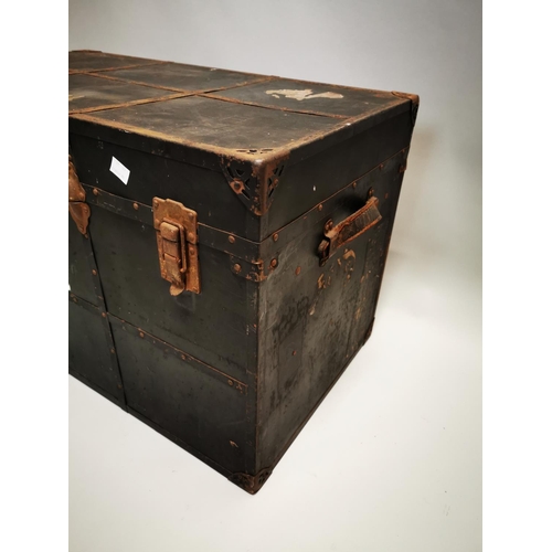 56 - Early 20th C. canvas and metal bound travelling trunk {56 cm H x 92 cm W x 51 cm D}.