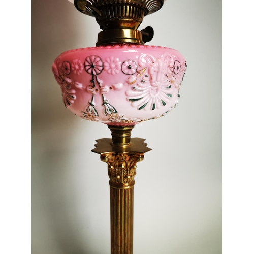 69 - Victorian brass Corinthian column table lamp with pink glass bowl and ruby etched tulip shade {78 cm... 