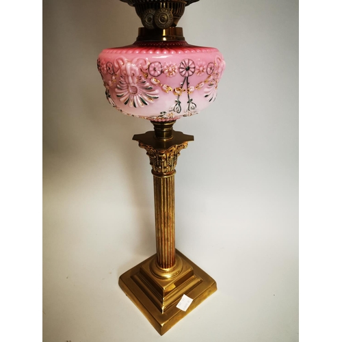 69 - Victorian brass Corinthian column table lamp with pink glass bowl and ruby etched tulip shade {78 cm... 