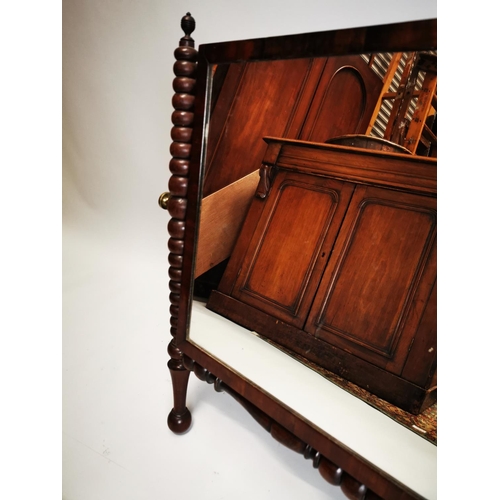 79 - Late Georgian mahogany dressing table mirror on two turned bottom column and turned stretcher {64 cm... 