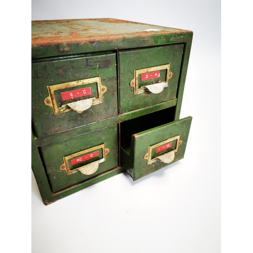 90 - 1940s metal industrial bank of four drawers {29 cm H x 24 cm W x 36 cm D}.