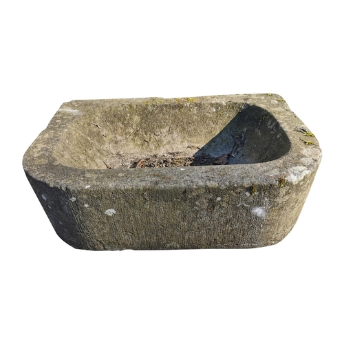 434 - 18th C. sandstone D-end trough {23 cm H x 76 cm W x 53 cm D}.