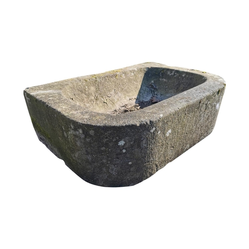 434 - 18th C. sandstone D-end trough {23 cm H x 76 cm W x 53 cm D}.