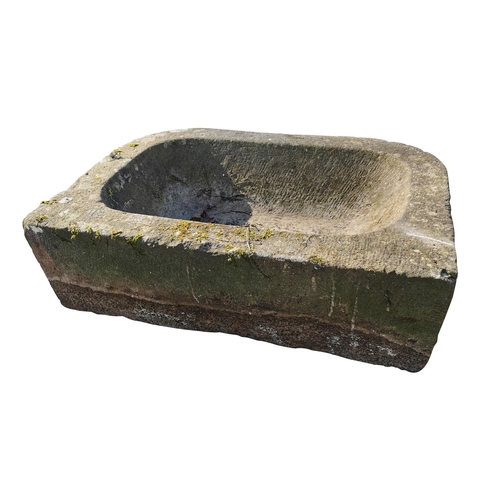 434 - 18th C. sandstone D-end trough {23 cm H x 76 cm W x 53 cm D}.