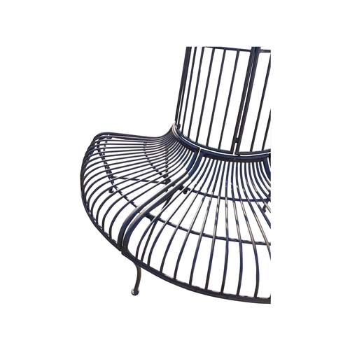 438 - Decorative metal tree surround garden bench {85 cm H x 143 cm W x 66 cm D}.