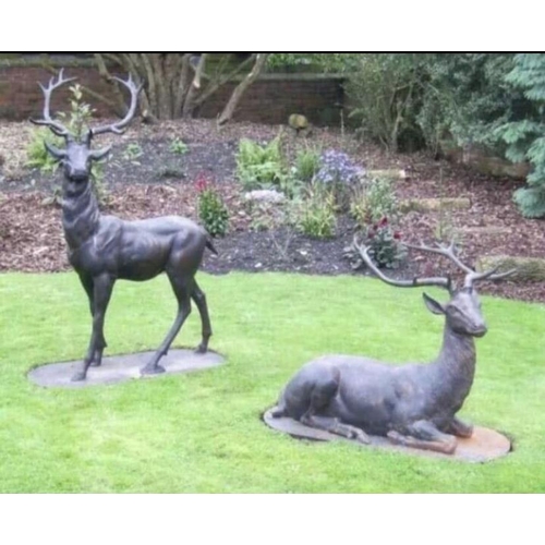 440A - Two decorative cast iron models of Stags {Standing stag is 152 cm H}.