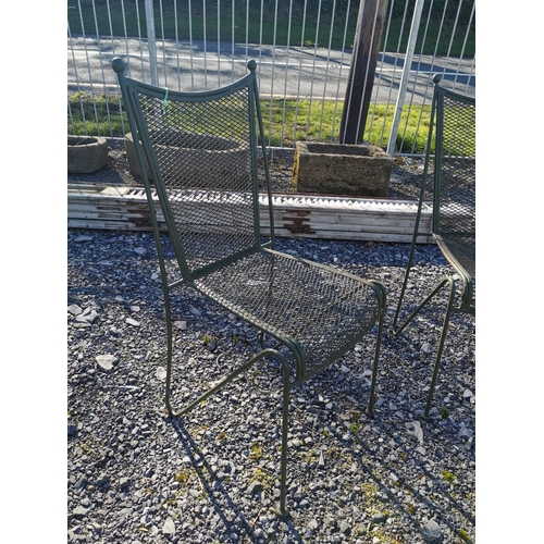 442 - Set of four metal garden chairs.