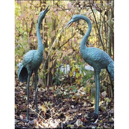 445A - Pair of bronze Stork fountains {107 cm H}.