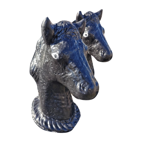461 - Pair of composition horse head pier caps {46 cm H x 20 cm W x 36 cm D}.