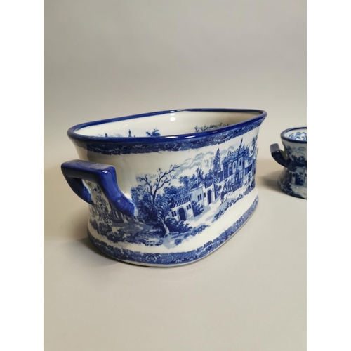 102 - Two blue and white ceramic foot baths { 21cm H X 45cm W X 30cm D & 14cm H X 34cm W X 22cm D }.
