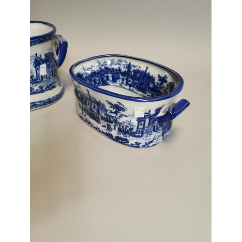 102 - Two blue and white ceramic foot baths { 21cm H X 45cm W X 30cm D & 14cm H X 34cm W X 22cm D }.