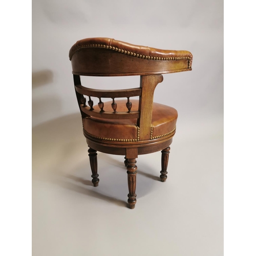 103 - 19th. C. leather upholstered mahogany desk chair , raised on turned and reeded legs. { 79cm H X 60cm... 