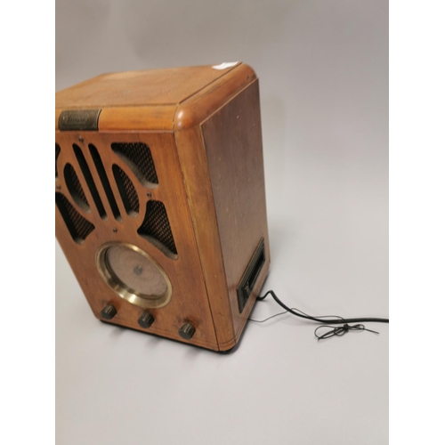 105 - Art Deco style radio. { 34cm H X 25cm W X 19cm D }.
