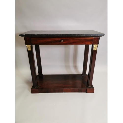 11 - 19th. C. mahogany side table, the marble top above a single drawer raised on square pillars decorate... 