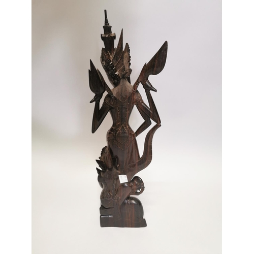 114 - Carved coromandel Oriental Deity . { 60cm H X 16cm W X 10cm D }.