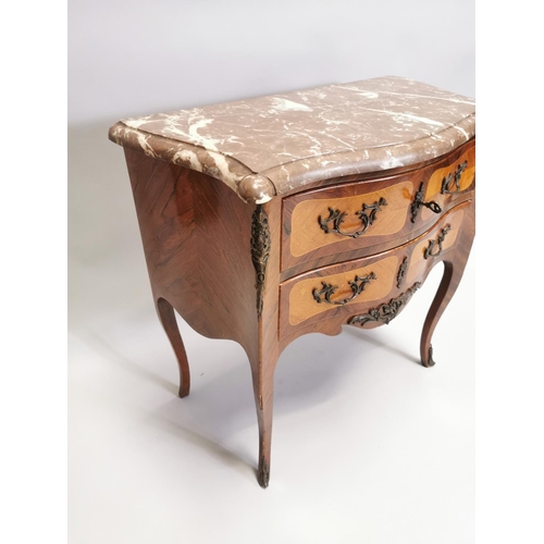 116 - Kingwood chest with metal mounts and two long drawers, raised on shaped legs. { 74cm H X 76cm W X 39... 