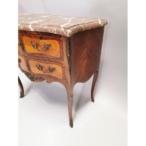 116 - Kingwood chest with metal mounts and two long drawers, raised on shaped legs. { 74cm H X 76cm W X 39... 