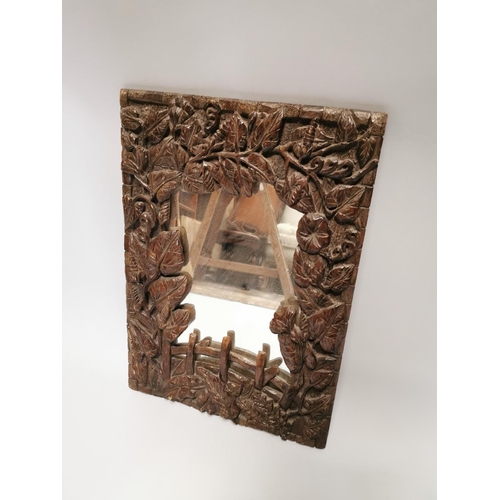 35 - Decorative early 20th. C. carved oak wall mirror. { 56cm H X 40cm W }.