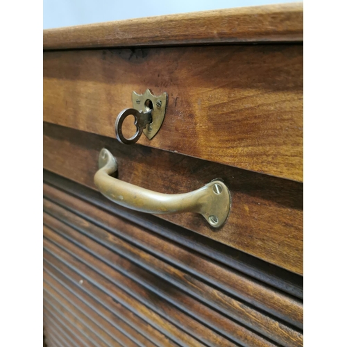 5 - Early 20th. C. oak filing cabinet with tambour door. { 120cm H X 66cm W X 65cm D }.