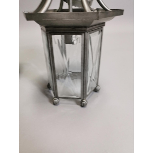 63 - Two metal lanterns { Each 45cm H X 20cm Dia }.