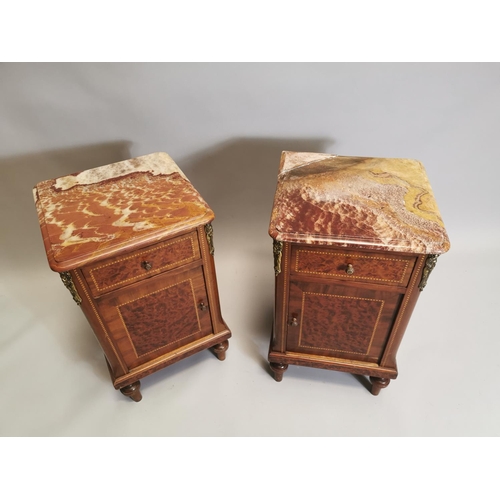 97 - Pair of 19th. C. kingwood and burr walnut bedside lockers with brass mounts the marble tops above si... 
