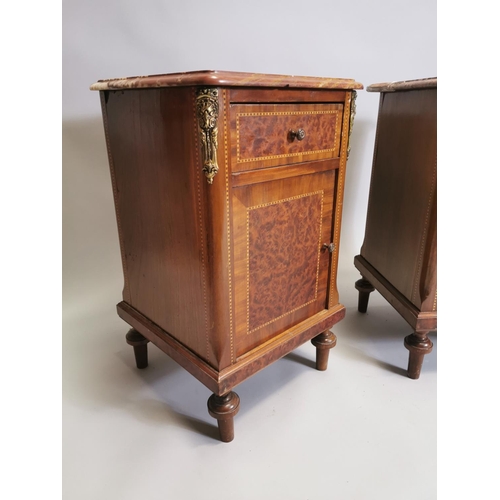 97 - Pair of 19th. C. kingwood and burr walnut bedside lockers with brass mounts the marble tops above si... 