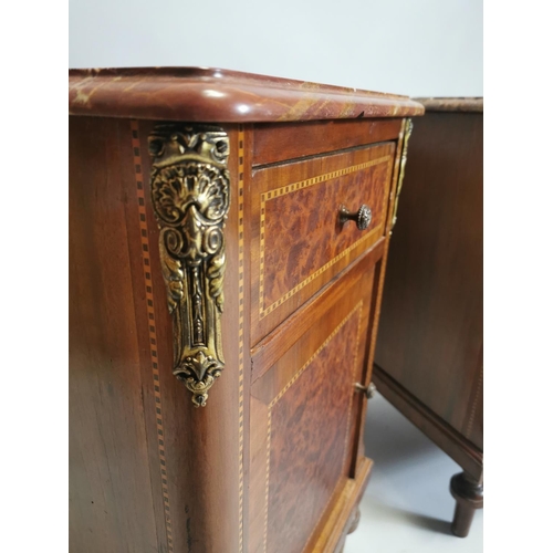 97 - Pair of 19th. C. kingwood and burr walnut bedside lockers with brass mounts the marble tops above si... 