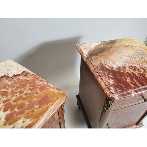 97 - Pair of 19th. C. kingwood and burr walnut bedside lockers with brass mounts the marble tops above si... 