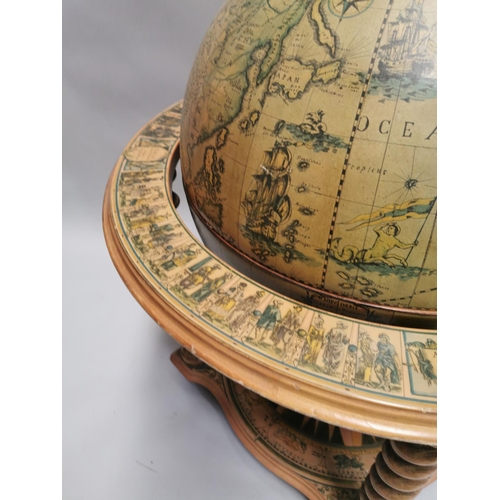98 - Drinks' cabinet in the form of a globe on stand with fitted interior . { 103cm H X 80cm Dia }.