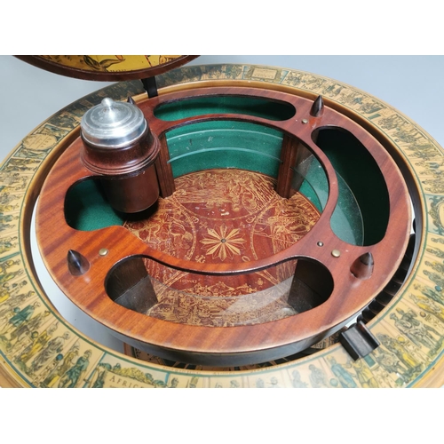 98 - Drinks' cabinet in the form of a globe on stand with fitted interior . { 103cm H X 80cm Dia }.