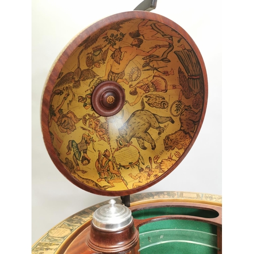 98 - Drinks' cabinet in the form of a globe on stand with fitted interior . { 103cm H X 80cm Dia }.