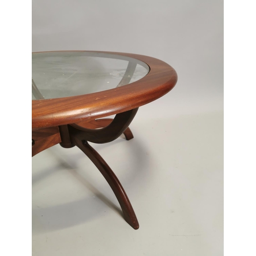 99 - Retro teak coffee table with inset glazed plate. { 44cm H X 78cm Dia }.