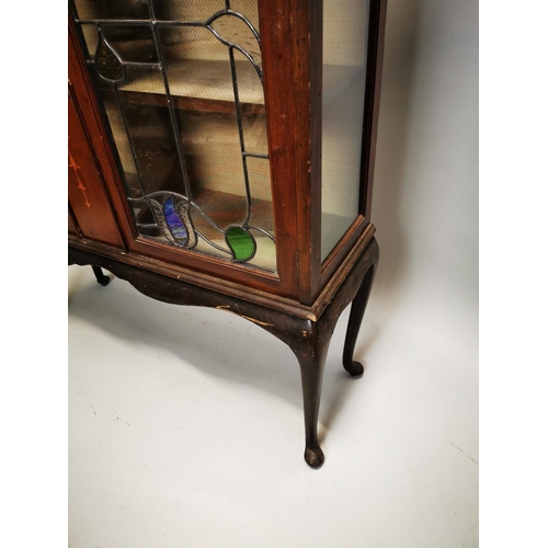 21 - Edwardian inlaid mahogany display cabinet the two glazed doors with coloured leaded glass inserts, r... 