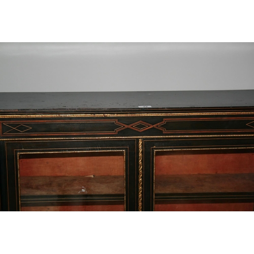 22 - Victorian two door side cabinet mainly ebonised with amboyna inlay throughout and ormolu mounts (som... 