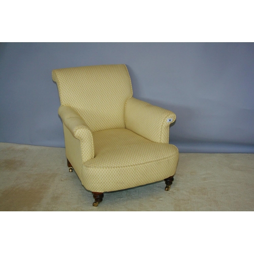 50 - Edwardian upholstered occasional armchair on brass casters 75 W x 80 H x 90 D