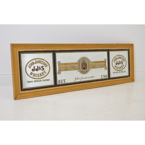 546 - John Jamesons Whiskey - Smooth Irish Whiskey framed advertising mirror {53 cm H x 169 cm W}.