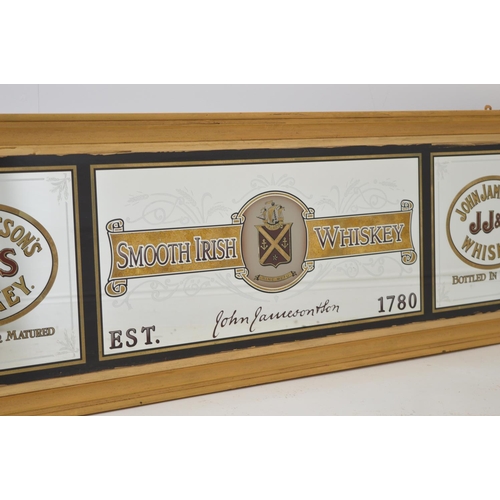 546 - John Jamesons Whiskey - Smooth Irish Whiskey framed advertising mirror {53 cm H x 169 cm W}.