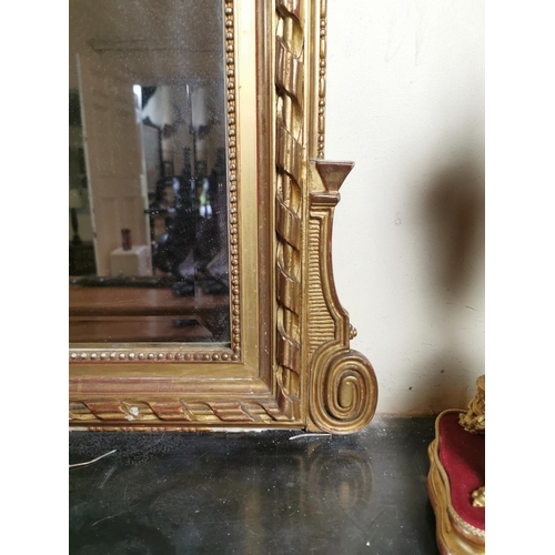 115 - Good quality 19th. C. giltwood overmantle decorated with swags and foliage { 174cm H X 122cm W }.