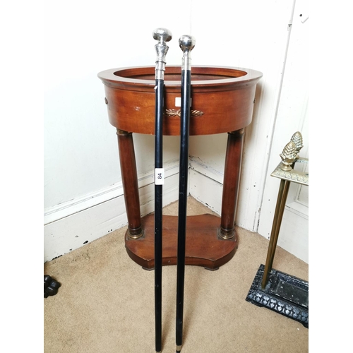 84 - Two wooden walking sticks with silver plated finials { 95cm H & 92cm H }.