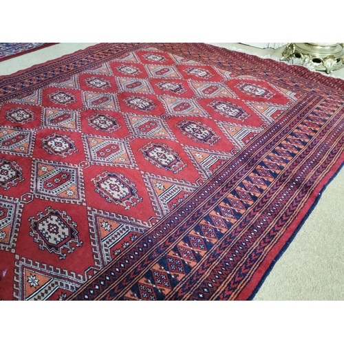 97 - Good quality vintage Afhgan Bokhara wool rug { 247cm L X 163cm W }.