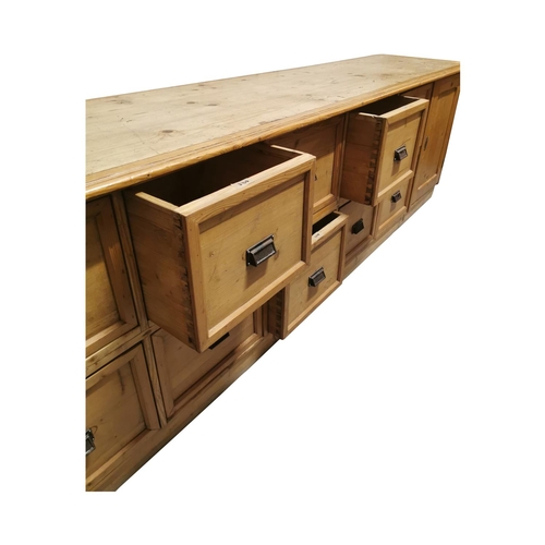 1 - Good quality pine shop counter bank of drawers. The top with three inset wide planks above six drawe... 