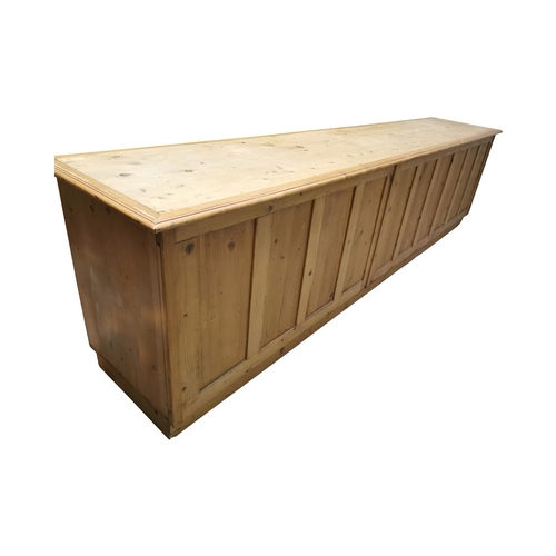 1 - Good quality pine shop counter bank of drawers. The top with three inset wide planks above six drawe... 