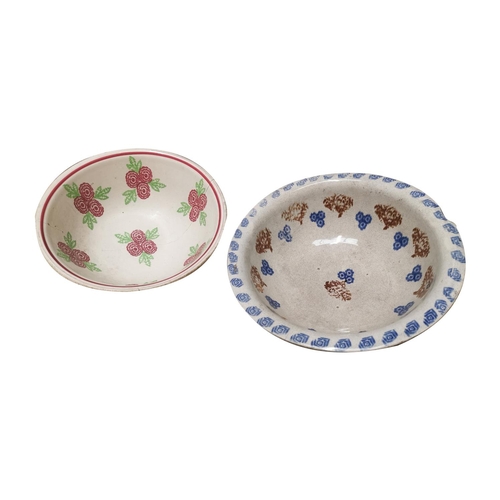 14 - Two early 20th C. spongeware bowls decorated with flowers {each 12cm H x 34cm Dia.}