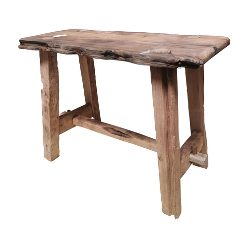 23 - Early 20th C. rustic oak stool raised on four square legs and stretcher {43cm H x 61cm W x 23cm D}