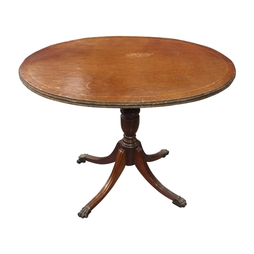 28 - Inlaid mahogany wine table raised on turned column four outswept legs with brass paw feet { 53 cm H ... 