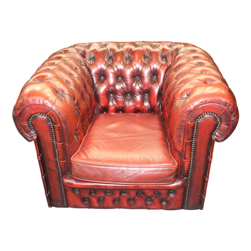 43 - Good quality deep buttoned ox blood leather upholstered club chair  { 67cm H x 100 cm W x 90 cm D}
