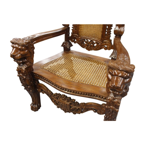 55 - Pair of good quality highly carved mahogany throne chair the arms rests terminating in lion's masks ... 