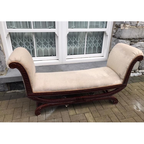 945 - Mahogany upholstered double ended chaise longue raised on scrolled legs { 183cm L }.