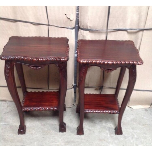 946 - Pair of mahogany two tier lamp tables